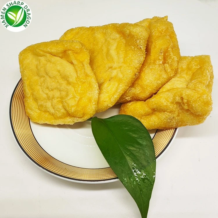 Fried tofu pocket form Golden fried tofu pockets arranged on a plate